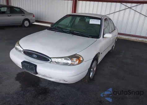 1999 Ford Contour Se from USA, damaged, VIN 1FAFP66L7XK208536